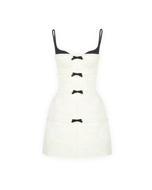 The Heiress Dress by Seonyo – white structured mini dress with bow detailing